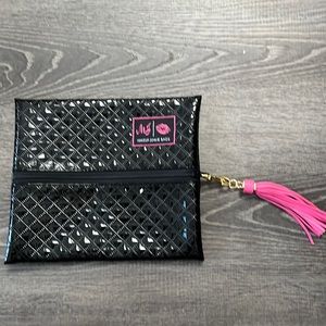 New without tags never used small make up junkie bag